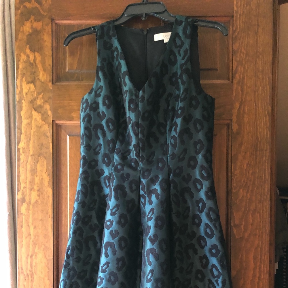 Green and black cocktail dress